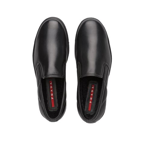 prada italy black men's leather slip on|Prada Slip.